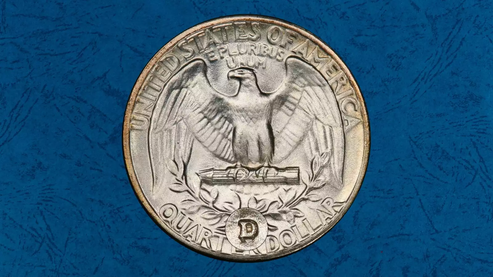 1951-D quarter reverse showing RPM FS-501 repunched D mint mark with overlapping impressions visible under magnification